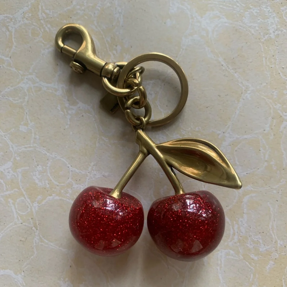 Coach Gold-Tone Keychain with Red Glitter Cherry Charm